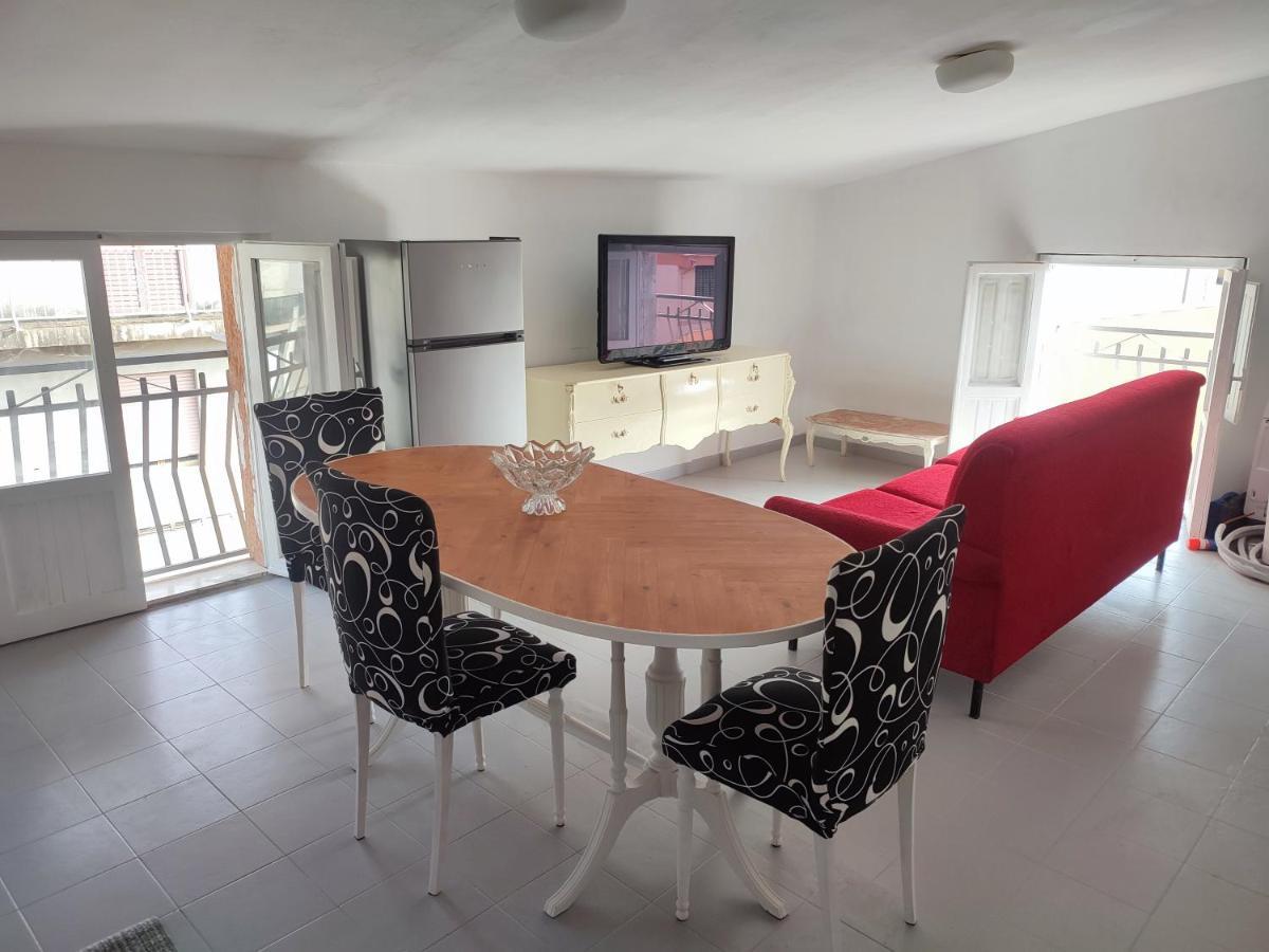 La Mansarda Apartment ตอร์โตลี ภายนอก รูปภาพ