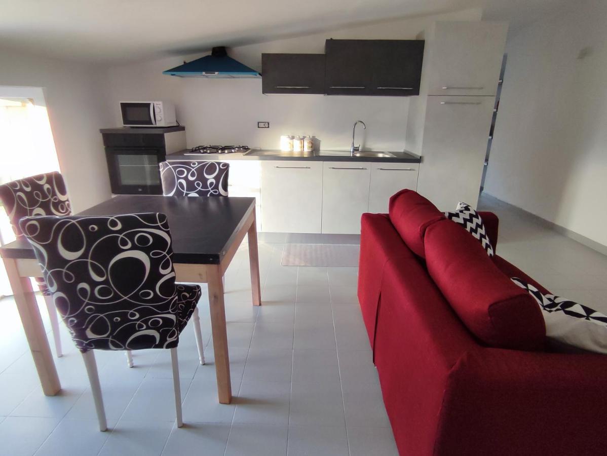 La Mansarda Apartment ตอร์โตลี ภายนอก รูปภาพ