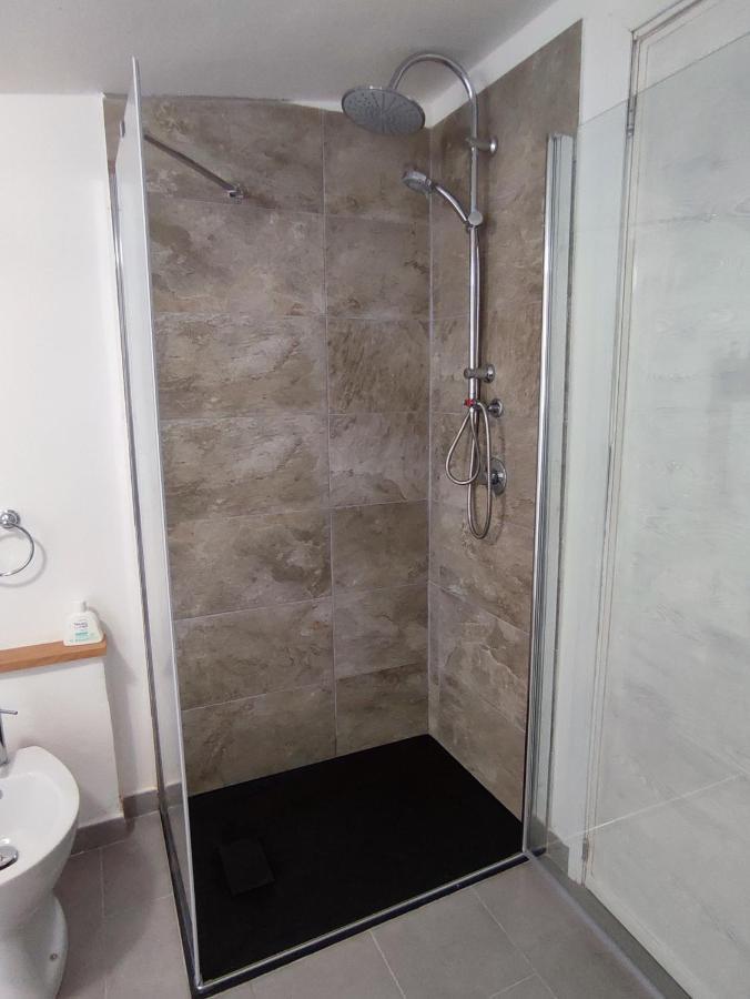 La Mansarda Apartment ตอร์โตลี ภายนอก รูปภาพ