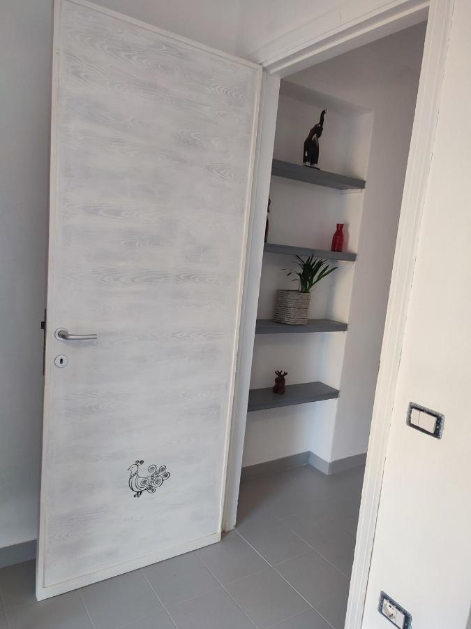 La Mansarda Apartment ตอร์โตลี ภายนอก รูปภาพ