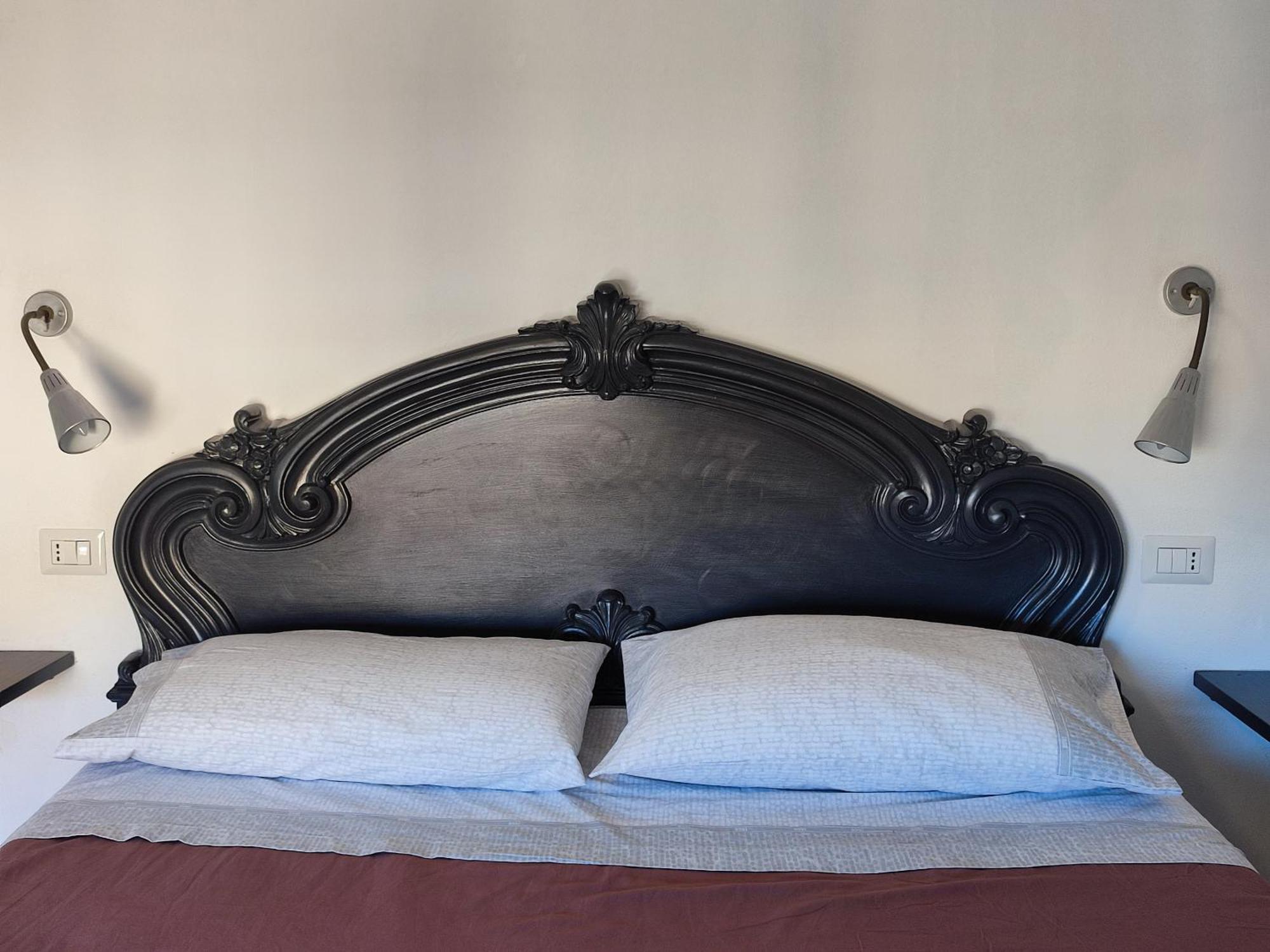 La Mansarda Apartment ตอร์โตลี ภายนอก รูปภาพ