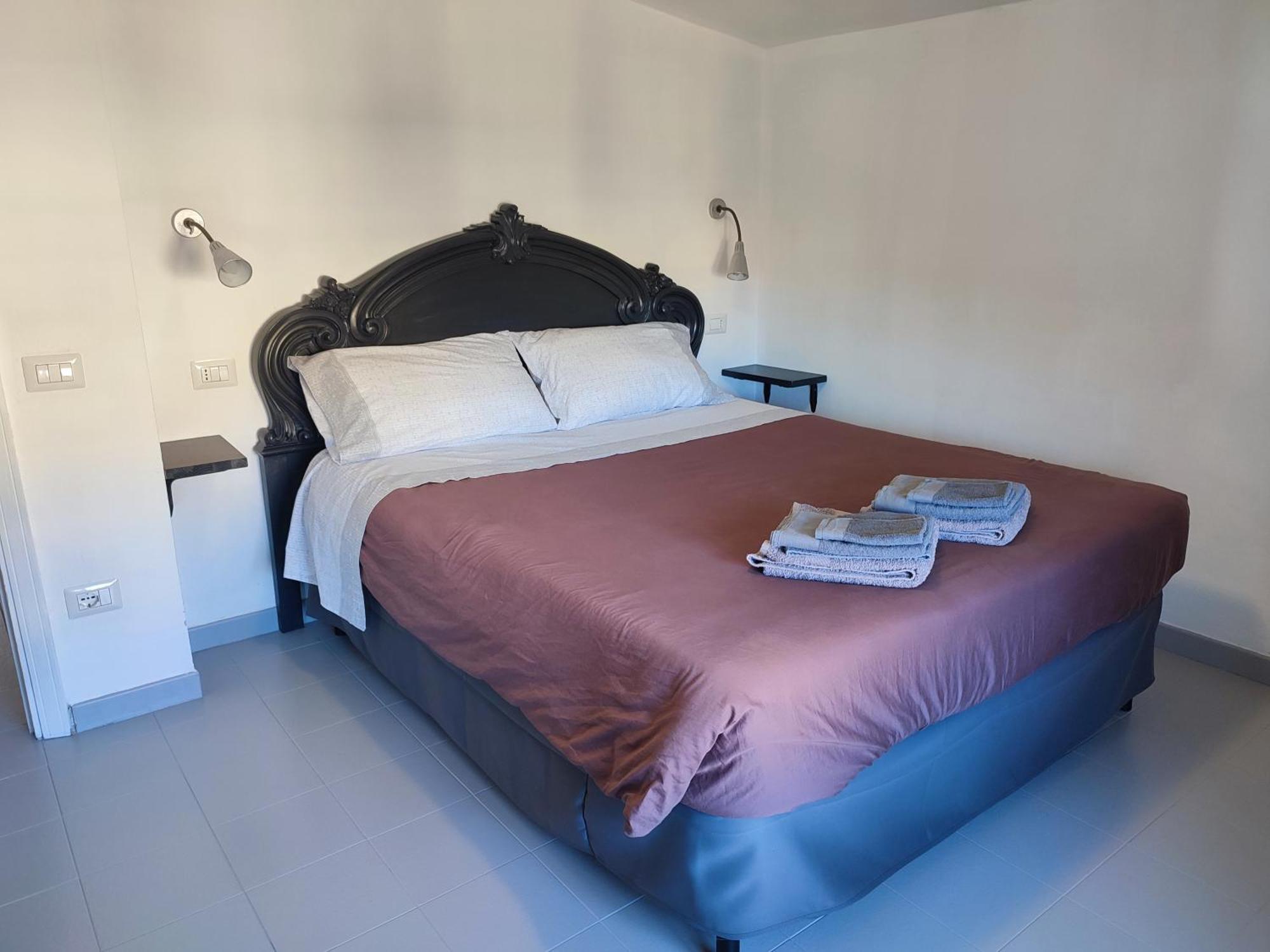 La Mansarda Apartment ตอร์โตลี ภายนอก รูปภาพ